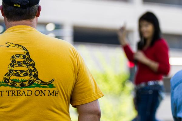 Man carries his sidearm to support the permitless carry law going into effect on July 1.