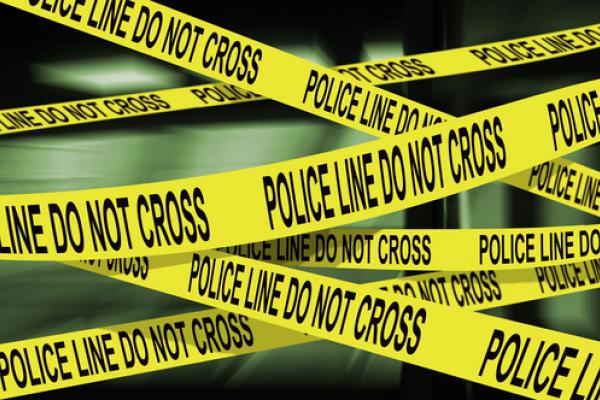 Police crime scene tape,  Luis Louro /Shutterstock.com