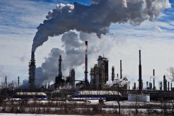 Oil refinery emissions, David Sprott / Shutterstock.com