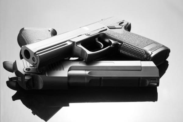 Handgun photo, Nomad_Soul / Shutterstock.com