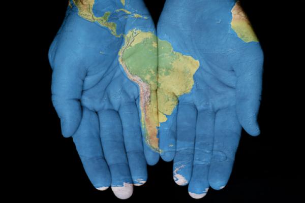 Map painted on hands, Jim Vallee / Shutterstock.com