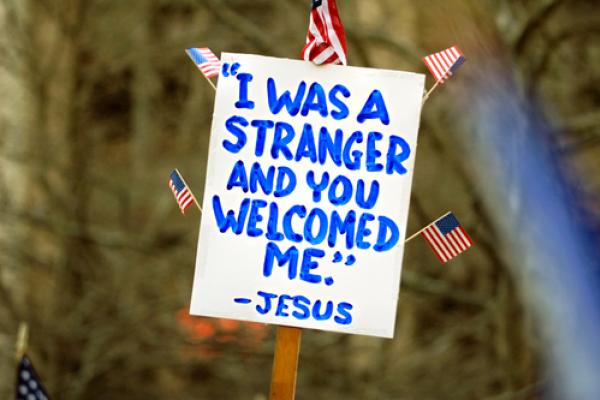 Sign at an immigration rally, Jorge Salcedo / Shutterstock.com