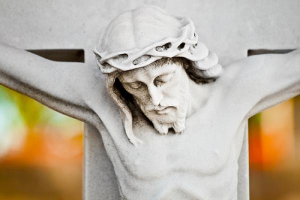 Jesus bows his head on the cross. Image courtesy Kamira/shutterstock.com