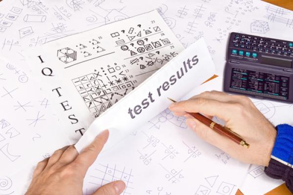 Person taking an IQ test. Photo courtesy RNS/shutterstock.com