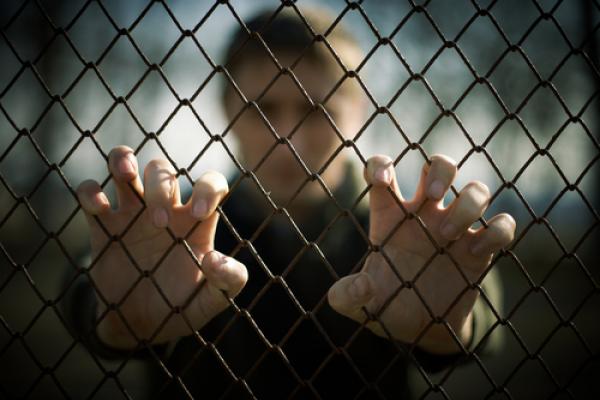 Prison photo, luxorphoto / Shutterstock.com