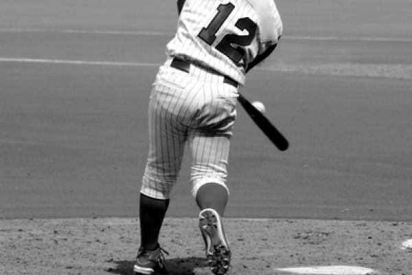 Black and white image of baseball player, Richard Paul Kane / Shutterstock.com