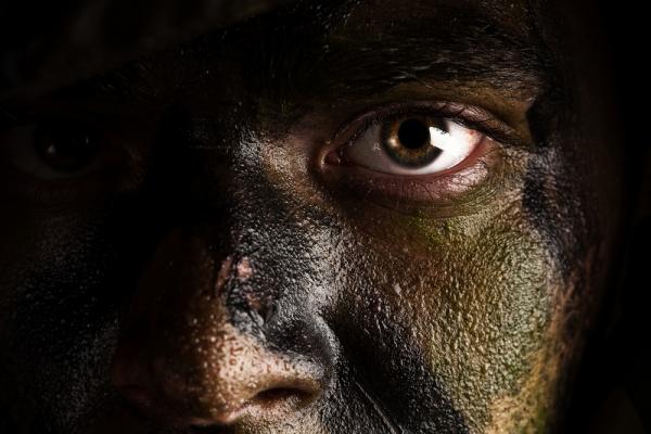 Soilder's face, Aaron Amat/Shutterstock.com