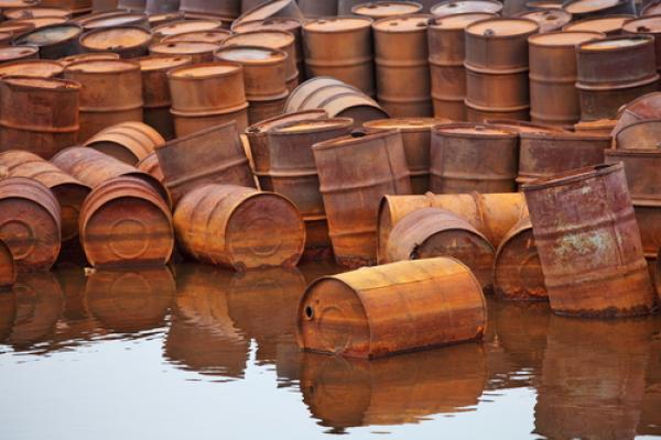 Rusty fuel and chemical drums on the Arctic coast, Vladimir Melnik / Shutterstoc
