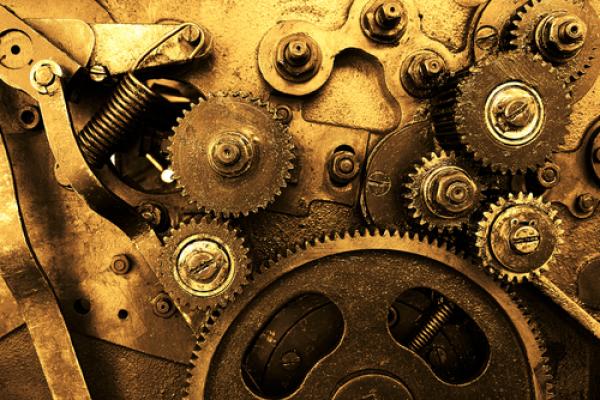 Photo: Clock gears, © Vitaly Korovin/ Shutterstock.com