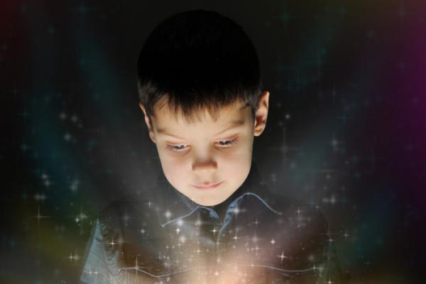 Boy reading a book, Valeriy Lebedev  / Shutterstock.com