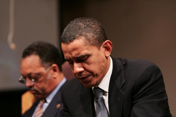 Obama in prayer. Image courtesy Stephen C./shutterstock.com