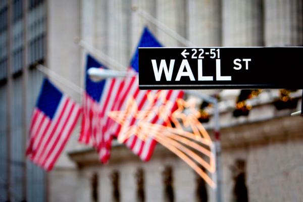 Wall Street sign outside New York Stock Exchange, Stuart Monk / Shutterstock.com