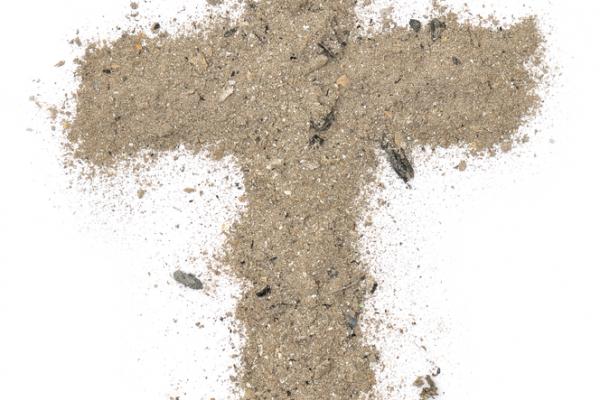 A cross made of ash. Image courtesy Ansis Klucis/shutterstock.com