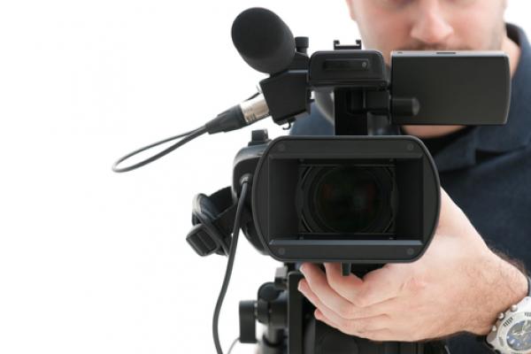 Video camera operator, © Rido/ Shutterstock.com