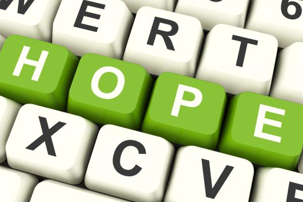 "Hope" spelled out on a keyboard. Image via Stuart Miles/shutterstock.com