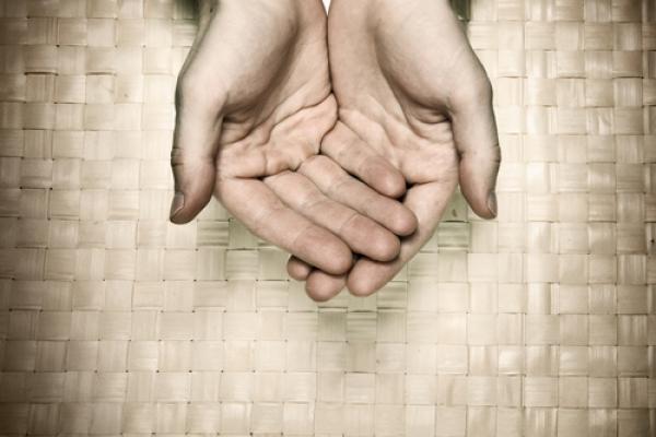 Offering hands, Antonov Roman/ Shutterstock.com