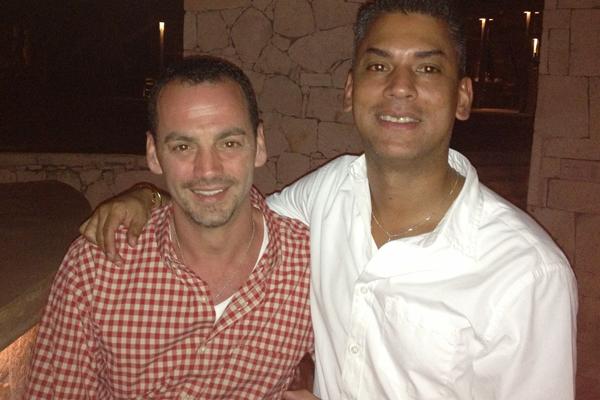 Nicholas Coppola (left) with his husband David Crespo at home. Photo via RNS/Nic