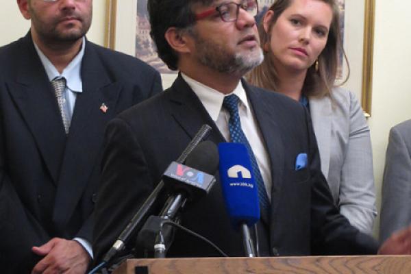 Azhar Azeez, president of the Islamic Society of North America, speaks at a joint evangelical Christian and Muslim event. Image via RNS.
