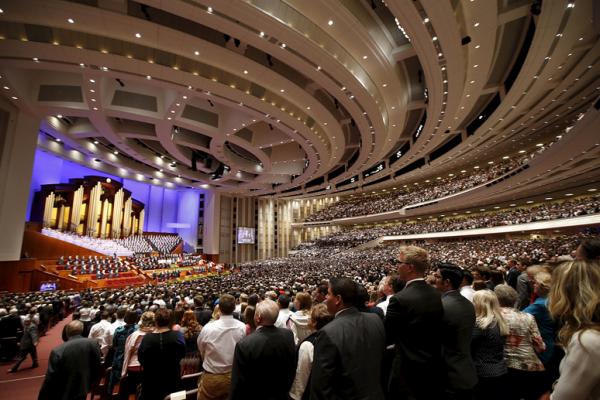 The Mormon Tabernacle Choir and conference goers sing in Salt Lake City, April 4