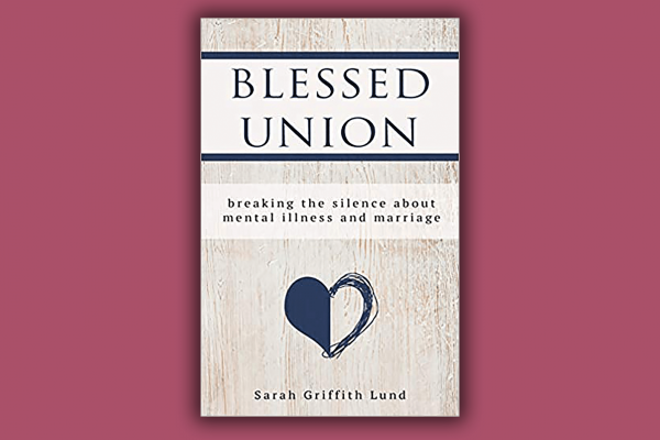 The cover of "Blessed Union" shows a heart scratched into a wooden table.
