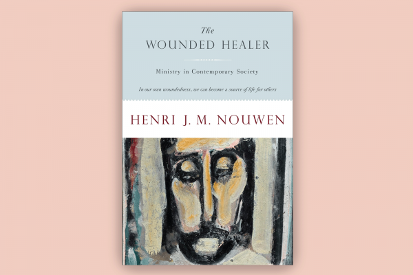 The image shows the cover of the book "The Wounded Healer" by Henry Nouwen 