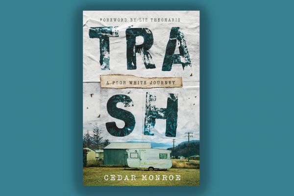The picture shows a book cover on a blue background. The book is called "Trash" and has a picture of a trailer on it. 