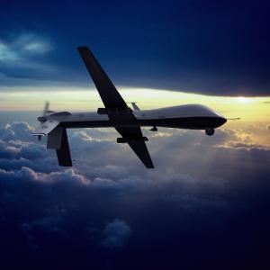 MQ-1 Predator Unmanned Drone with Hellfire Missiles Flying at Sunset. Erik Simonsen / Getty Images Erik Simonsen / Getty Images
