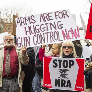 Protesters marching with the social activist group CREDO for stronger gun laws. PAUL J. RICHARDS/AFP/Getty Images PAUL J. RICHARDS/AFP/Getty Images