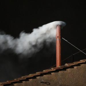 White smoke is seen from the roof of the Sistine Chapel, signaling a new pope. Peter Macdiarmid/Getty Images Peter Macdiarmid/Getty Images