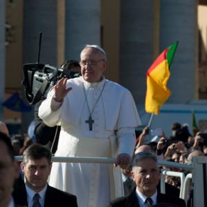 Pope Francis waves from the pope-mobile during his inauguration Mass. RNS photo by Andrea Sabbadini RNS photo by Andrea Sabbadini