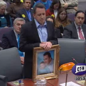 Neil Helin testifying in a Connecticut gun violence hearing. Neil Helin testifying in a Connecticut gun violence hearing.