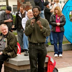 Aly Wane speaking at an event in Syracuse. Photo courtesy of Define American. Aly Wane speaking at an event in Syracuse - photo courtesy of Define American.