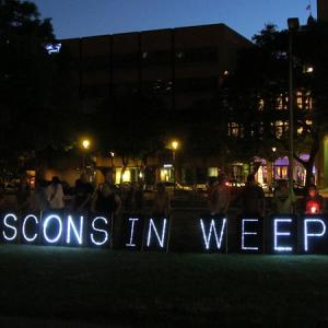 The Overpass Light Brigade at the prayer vigil in Milwaukee. Courtesy Steve Jerb