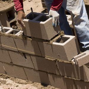 Cinder brick laying, Lou Oates / Shutterstock.com Cinder brick laying, Lou Oates / Shutterstock.com