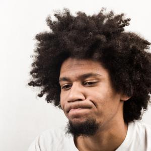 Disappointed young man, Katarzyna Wojtasik / Shutterstock.com