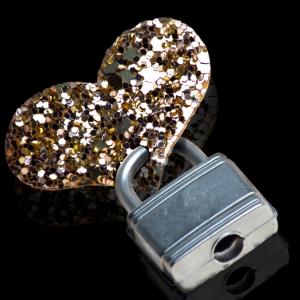 Heart lock and key photo, Paul J. West/Shutterstock.com