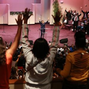 Rev. Al Sharpton speaks at Greater Grace Church in Florissant on Sunday. Image v