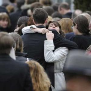 Some of the grieving are left wondering why God let this happen. RNS Photo RNS Photo
