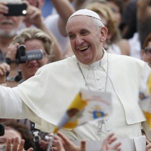 Pope Francis greets the crowd in St. Peter’s Square. Photo by Paul Haring/Catholic News Service Photo by Paul Haring/Catholic News Service