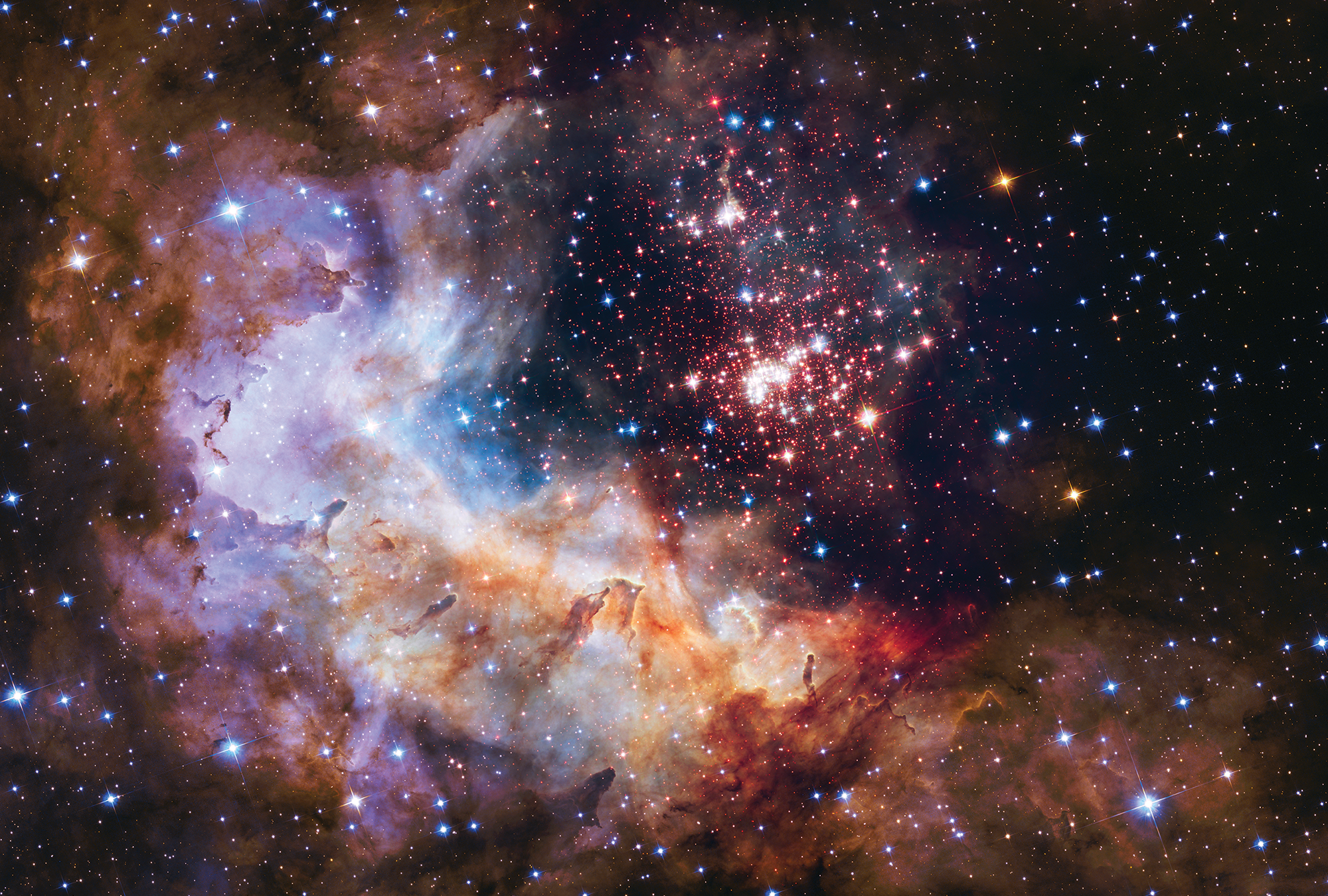 A dense cluster of about 3000 stars that resembles a glittery firework display