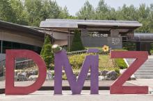 South Korea, Demilitarized Zone, Large DMZ sign at the Third Tunnel of Aggression site. Michelle Gilders / Getty Images Michelle Gilders / Getty Images