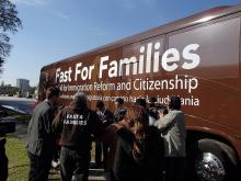 Fasters prayers in front of Rep Ted Poe's office outside the bus near Houston, Texas. Fast for Families/Flickr Fast for Families/Flickr