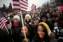 Revelers celebrate in front of the Washington Monument on Inauguration Day. Mario Tama/Getty Images Mario Tama/Getty Images