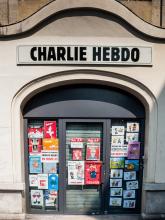 A Charlie Hebdo building with cartoons on the doors. Photo courtesy Brigitte Djajasasmita/Flickr. A Charlie Hebdo building with cartoons on the doors. Photo courtesy Brigitte Dja