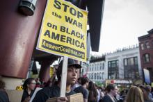 Protestors in DC march in solidarity with Baltimore. Image via JP Keenan/Sojourners. Protestors in DC march in solidarity with Baltimore. Image via JP Keenan/Sojourn