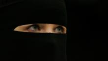 A woman wearing a niqab veil listens during a seminar. Photo by Scott Barbour/Getty Images Photo by Scott Barbour/Getty Images
