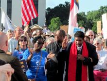 The Rev. William Barber, leading a Moral Monday demonstration in July 2013. Photo courtesy of twbuckner/Wikimedia.