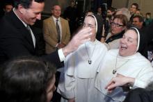 Rick Santorum greets nuns at a Knights of Columbus rally, Feb. 24. Getty Imagesa