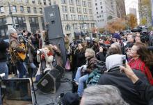 Joan Baez performs for Occupy Wall Street. Image from ph.cdn.photos.upi.com
