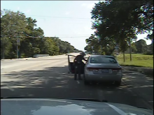 Screenshot from arrest video Screenshot from arrest video